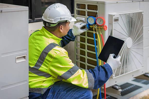 Professional Emergency Hvac Repair technician working in Island Park, NY